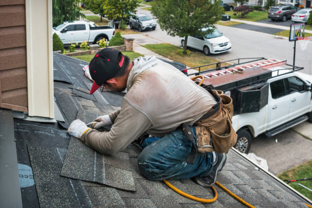 Professional Gutter Repair And Installation technician working in Center Cross, VA